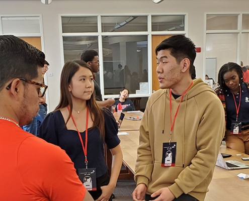 Students speak with representatives from BlackRock at the Miller Learning Center in February